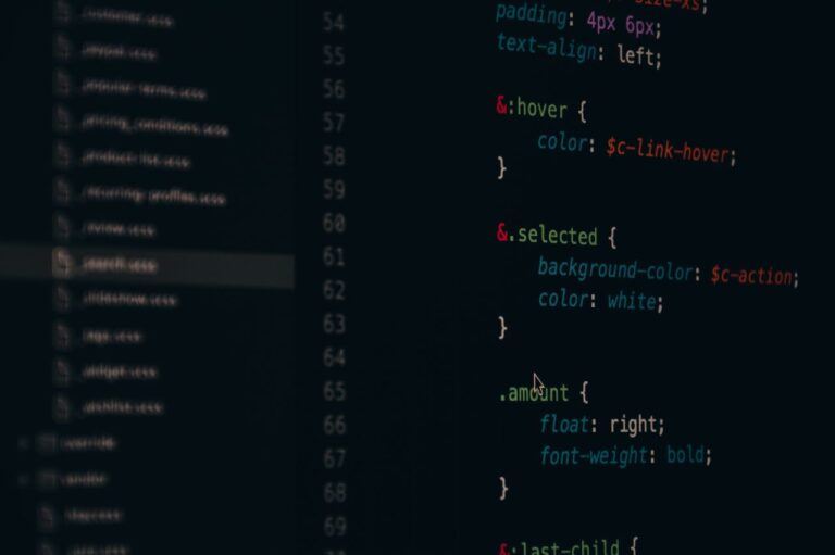 Close-up of colorful CSS code lines on a computer screen for web development.